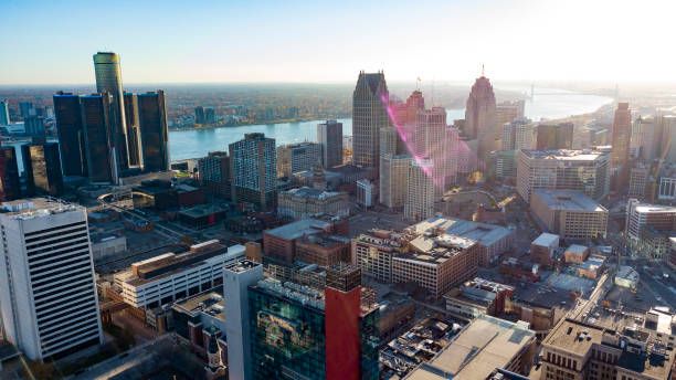 The skyline of the city of Detroit, MI on a sunny day with lens flare stock photo