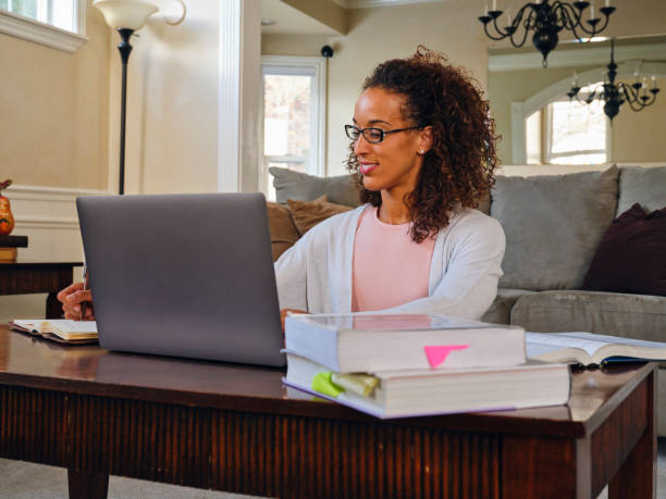 istock Woman Studying Online in a Home 1285570287