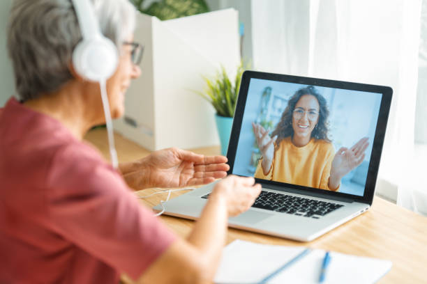 istock Senior woman is using laptop 1285575764