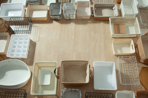 istock Top view of closet organization boxes and steel wire baskets in different shapes 1285581154