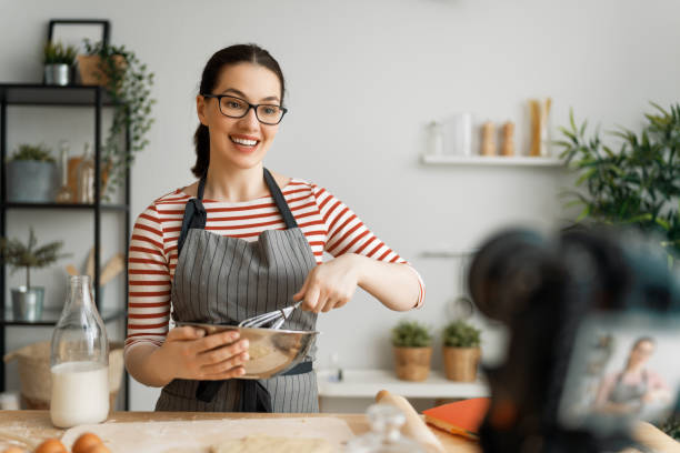 istock woman is recording vlog about cooking. 1285587112