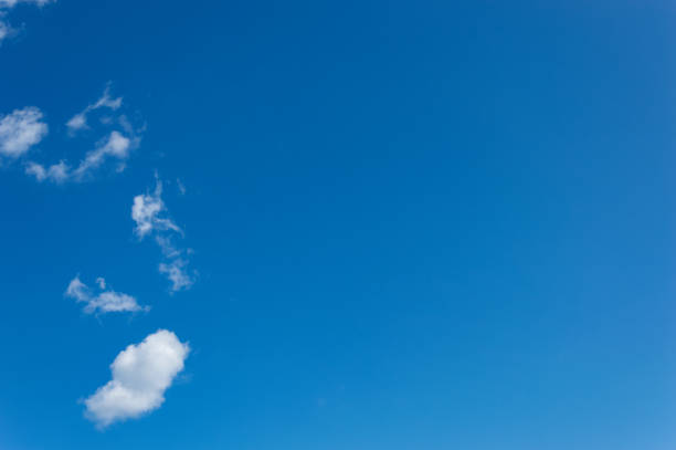 istock Bright blue sky with white clouds scattered on a natural background 1285596406