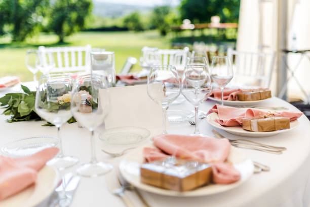 istock Luxury wedding table decoration in pink and white. Special event table set up. Fresh flower decoration. 1285597112