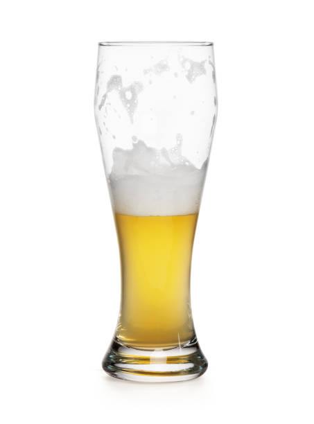 istock half empty glass of a light lager beer isolated 1285602349