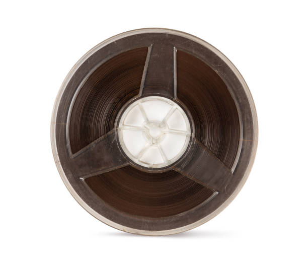 istock Vintage old magnetic audio tape reel isolated 1285602571