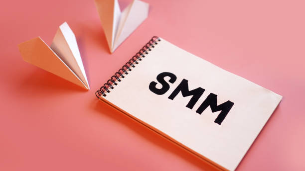 istock Social media marketing concept - SMM on a pink background 1285602987