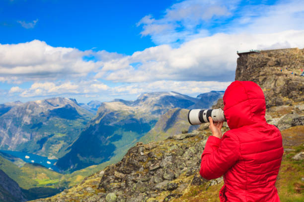 istock Tourist taking photo from Dalsnibba area Norway 1285605270