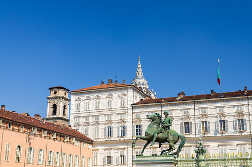 Turin, Italy, September 10, 2018: Statua equestre di Polluce monument in front of Royal Palace Palazzo Reale