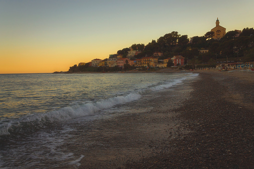 Sunset on the beach in Bussana, Italy