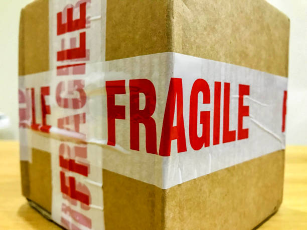 istock Box of goods with tape stating it is fragile 1285613605