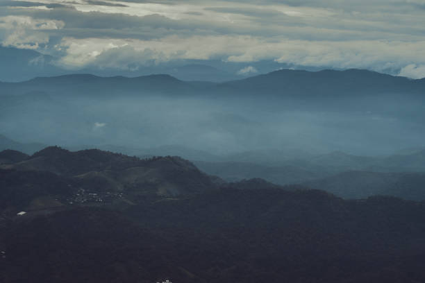 istock fog and cloud mountain valley sunset landscape, Chiang Mai Thailand 1285616520