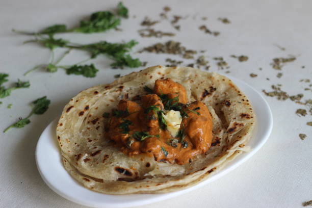 istock Homemade Malabar parotta with butter chicken 1285619006