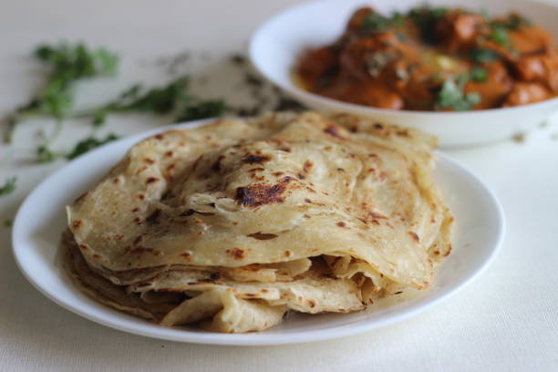 istock Homemade Malabar parotta with butter chicken 1285619786