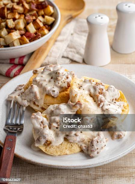 Biscuits And Sausage Gravy Stock Photo - Download Image Now - Biscuit - Quick Bread, Gravy, Sausage