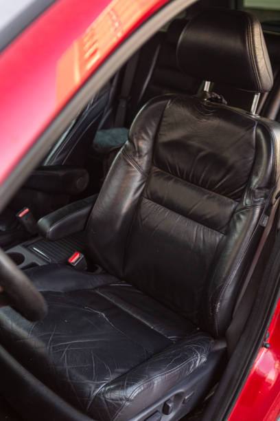 istock Used car leather close up 1285624839
