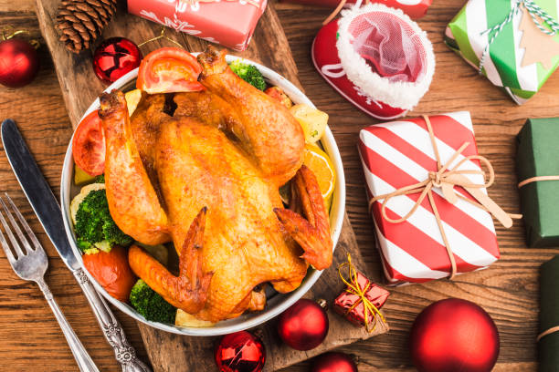 istock Roasted whole chicken with Christmas decoration. 1285626340
