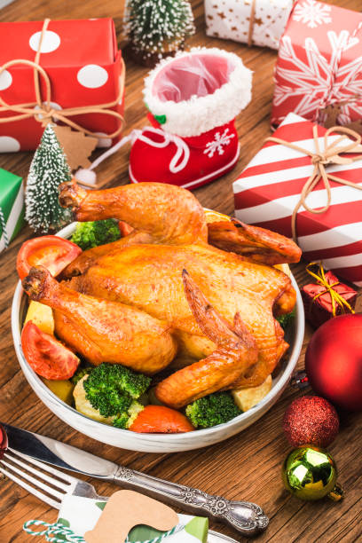 istock Roasted whole chicken with Christmas decoration. 1285627011