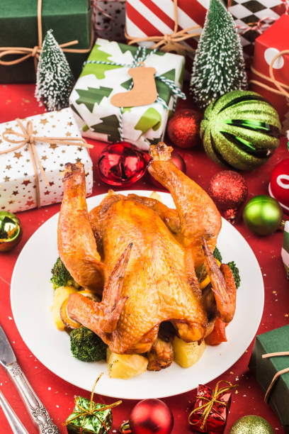 istock Roasted whole chicken with Christmas decoration. 1285627567