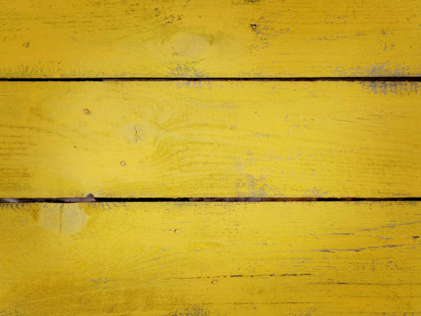 istock background of boards painted with yellow paint 1285629424