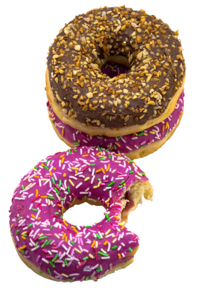 istock pink and brown doughnut, chocolate and berry doughnut, strawberry and raspberry doughnuts, walnut donut on a white background 1285630252