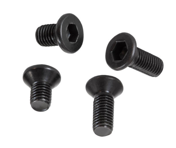 Four very small bolts isolated on white