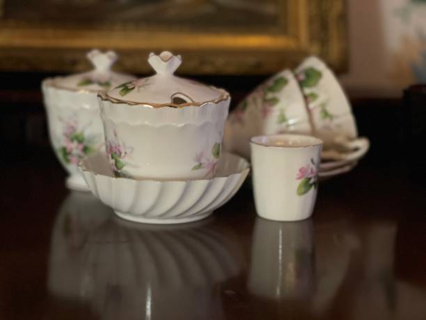 istock Porcelain bone china tea set floral on wood table 1285633536