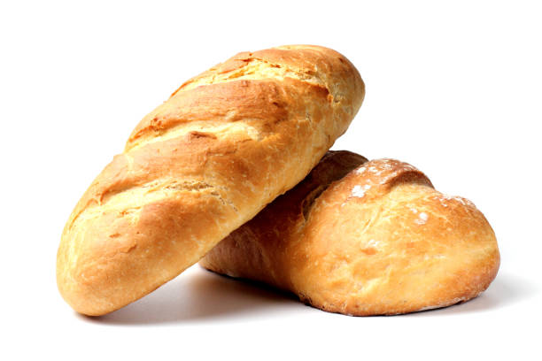 istock Homemade white bread or loaf, close-up, white background, isolate, ideal for quarantine. 1285634902