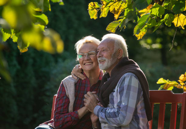 istock Happy senior couple in garden 1285637324