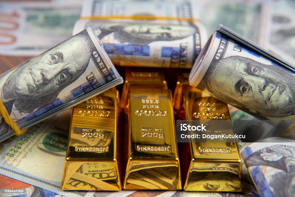 American currency Dollar and Gold ingot combinations. Close up for dollar and gold ingot Gold - Metal Stock Photo