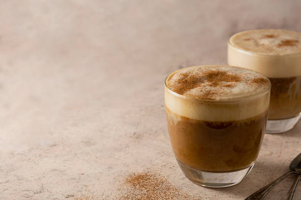 istock Two glasses of coffee drink with whipped milk, latte hot drink, copy space. 1285643648