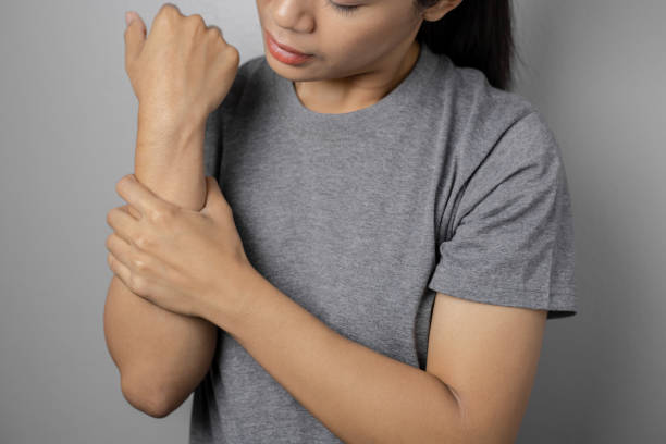 istock Woman suffering from pain in arm. 1285647155