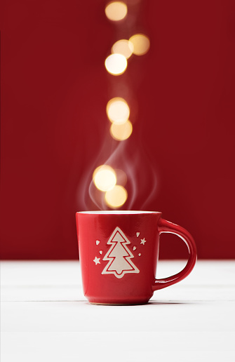 Christmas winter hot drink in a cup. Winter holiday concept. Minimal New Year background.