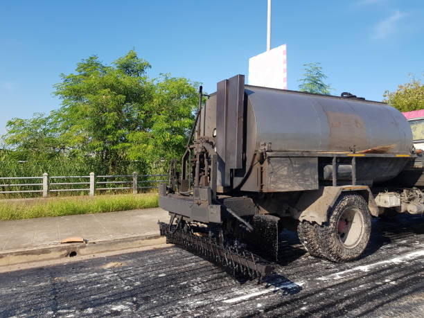 istock Road roller and asphalt compactor parked on the side of the road during lunch break 1285648436