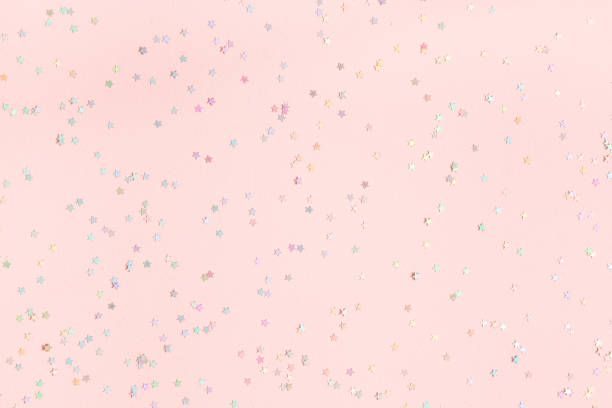 istock Christmas composition. Confetti decorations on pastel pink background. Christmas, winter, new year concept. Flat lay, top view, copy space 1285648983