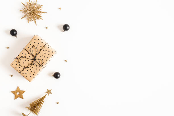 istock Christmas composition. Gift boxes, black and golden decorations on white background. Christmas, winter, new year concept. Flat lay, top view, copy space 1285648987
