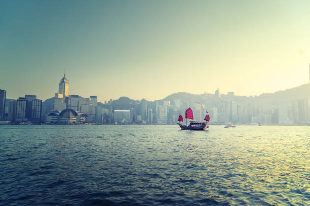istock Hong Kong harbour in sunset time 1285650108