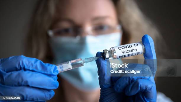 Covid19 Coronavirus Vaccine In Doctor Hands Stock Photo - Download Image Now - COVID-19 Vaccine, Vaccination, Coronavirus