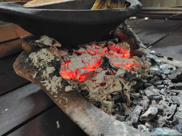 istock Cooking with live coals in traditional stove 1285653721