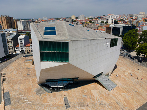 Porto, Portugal 25/6/2020: Casa da Música or Music House is a concert hall designed by Dutch architect Rem Koolhaas for the Porto European Capital of Culture event in 2001, but its construction was only completed in 2005. The large auditorium has a capacity of 1238 seats and the small auditorium does not have a fixed number of seats, but ranges from 300 seats to 650 seats. At the top of the building there is another place for shows.