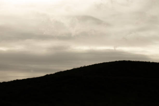 istock Silhouette mountain dark black and white 1285669465