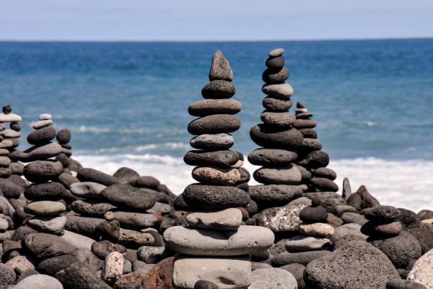 istock Stack of stones on the sea beach 1285674463