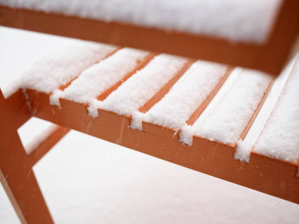 istock Snowy on patio seat 1285674842