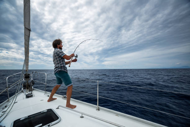 istock Young man fishing 1285677228