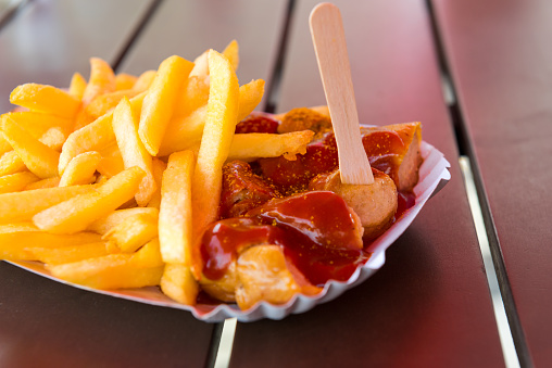 Curry wurst sausage with french fries, popular German street food