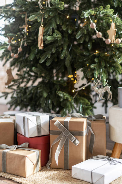 istock New year gifts under the christmas tree 1285680788