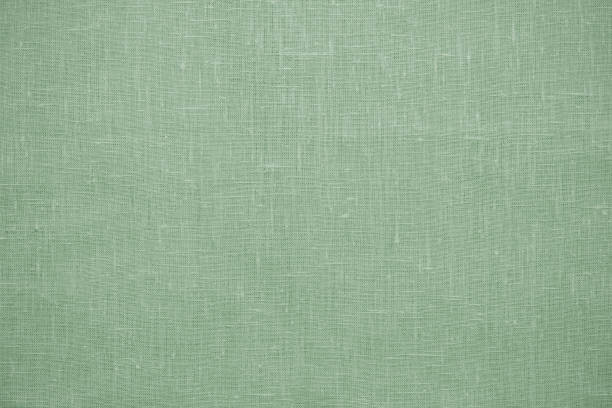 istock Green linen pastel fabric, background or texture 1285681849