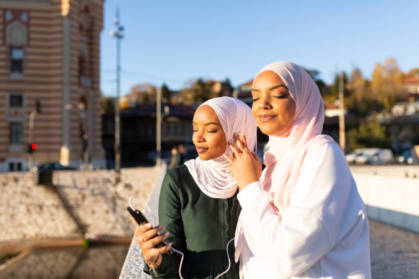 istock Two happy Middle eastern female tourists having fun together 1285686764