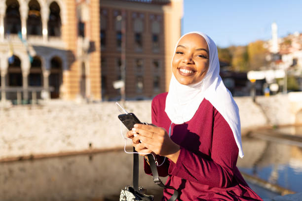 istock Portrait of a young middle eastern woman using a smart phone 1285687659