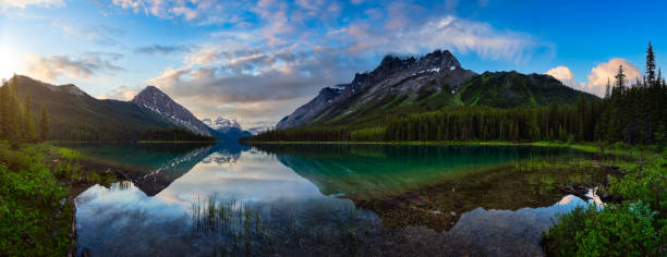 istock Panoramic View of Beautiful Marvel Lake surrounded by Mountains 1285694229