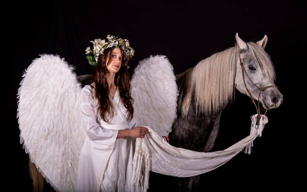 istock Angel Of Light & Her Horse. 1285696039
